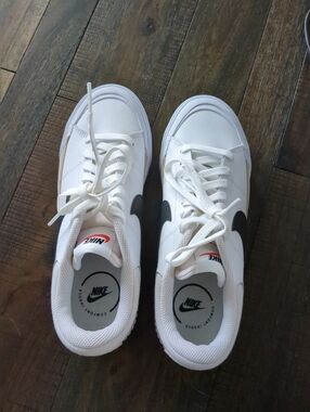 Nike Court Legacy LiftWhite Athletic Sneakers with Black Swoosh and Gold  Accent